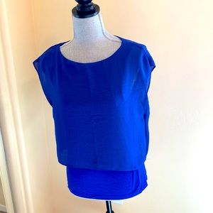 T Tahari summer top.Beautiful brilliant blue.Jersey/crinkle fabric overlay.Small